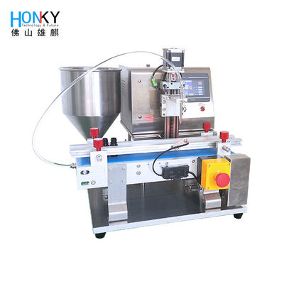 เครื่องบรรจุครีมเหลวสำหรับการผลิตแบบกลุ่มเล็กบนโต๊ะทำงาน พร้อมสายพานลำเลียง สำหรับบรรจุภัณฑ์เครื่องสำอางแบบกลุ่มเล็ก