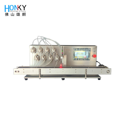 เครื่องเติมของชนิดโต๊ะทํางานชนิดคอนเวียร์ชนิด mold running สําหรับการเติมของน้ําเหลวในท่อกระป๋องที่ไม่ได้ยืน